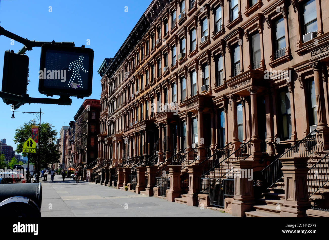Renovated historic brownstone apartment building on Lenox Avenue aka