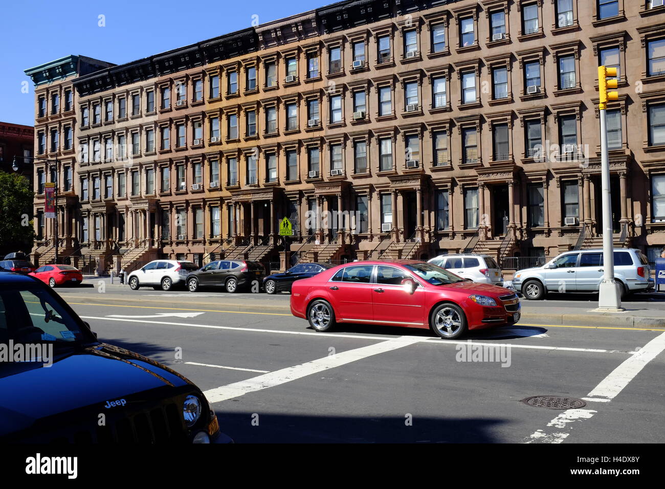 Renovated historic brownstone apartment building on Lenox Avenue aka