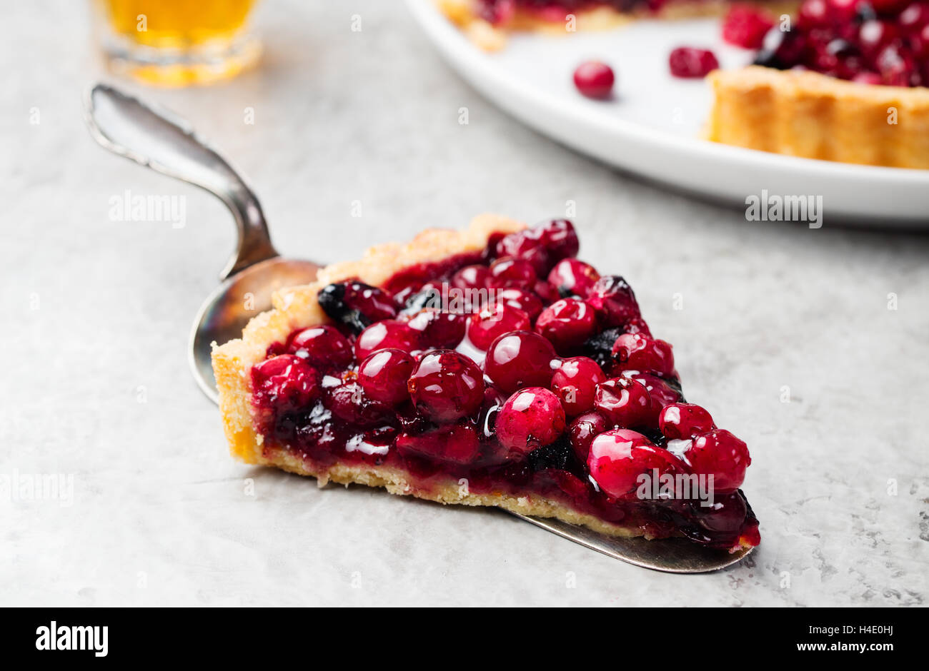 Tart, pie, cake with fresh cranberries, bilberries Stock Photo - Alamy