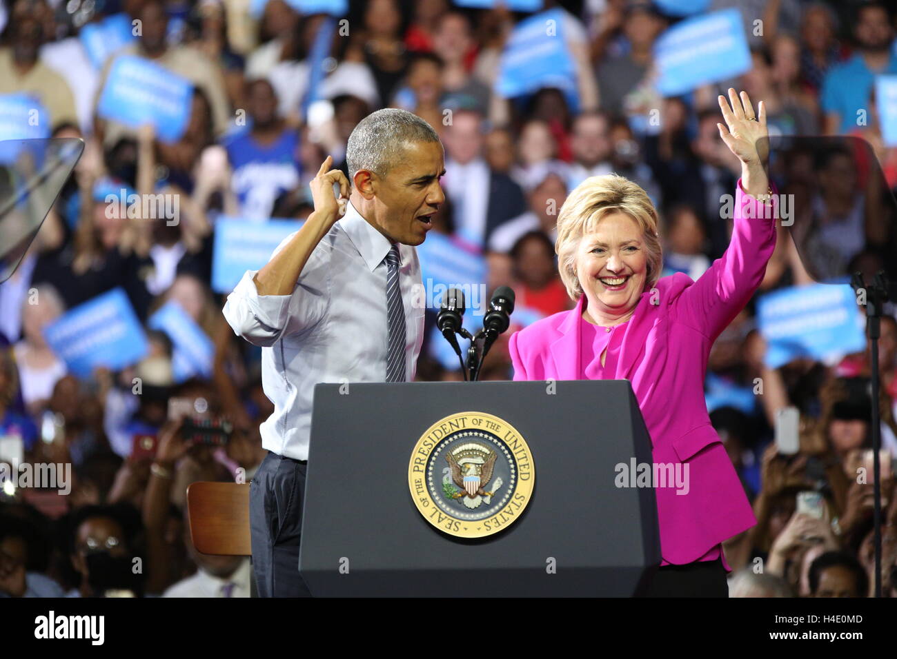 President Barack Obama and Presidential candidate Hillary Rodham Clinton appear before the crowd in Charlotte, NC at the Charlotte Convention Center on July 5th, 2016. Stock Photo