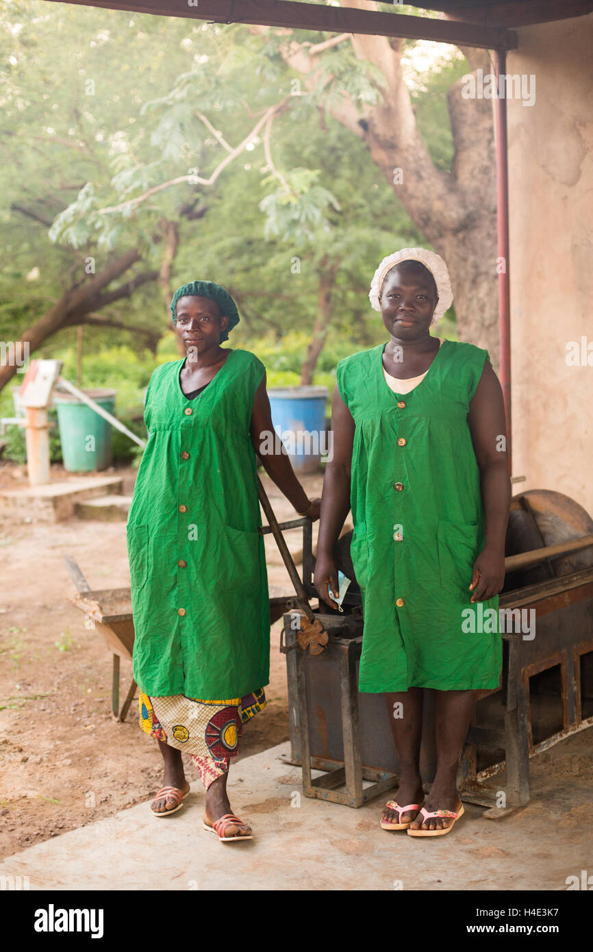 Employees stand together at a fair trade shea butter production facility in Réo, Burkina Faso, West Africa. Stock Photo