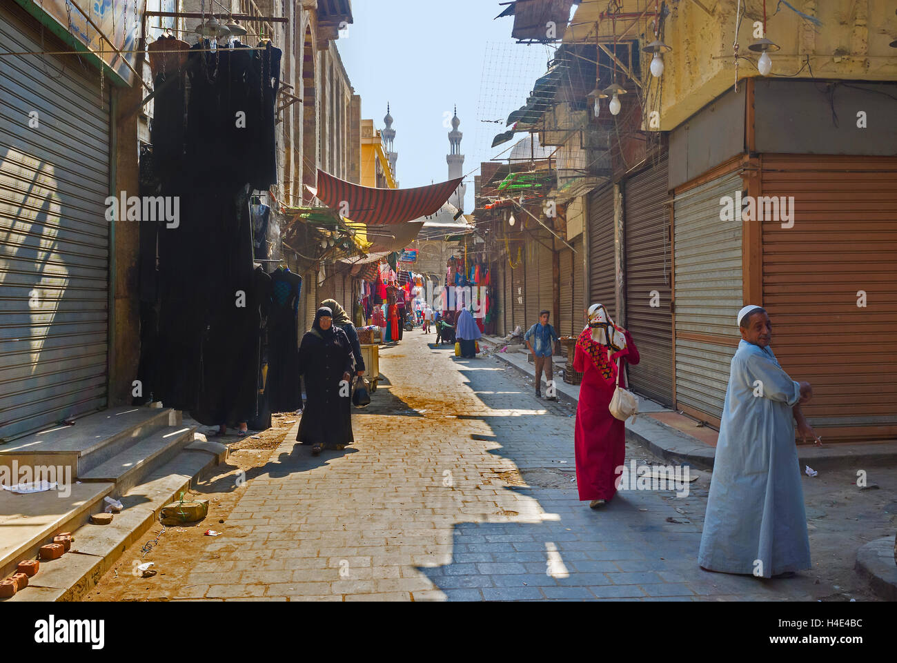 The open abaya shop (traditional women black dresses) in Al-Muizz street market, Cairo Egypt Stock Photo