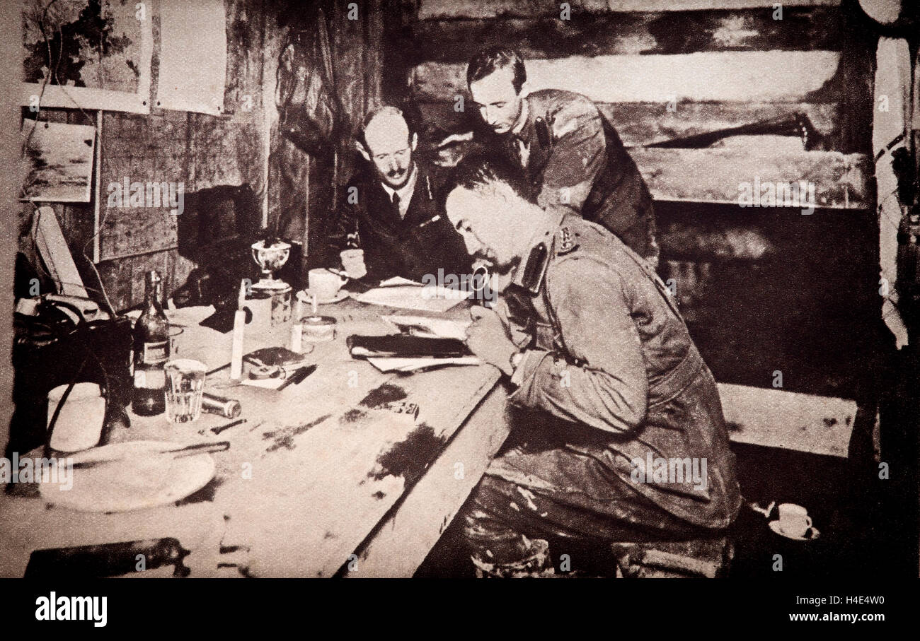 Briitish staff officers HQ in a dug-out on the Western Front. They were upto 20 feet below the trenches and included rough table and chairs and sack beds. Stock Photo