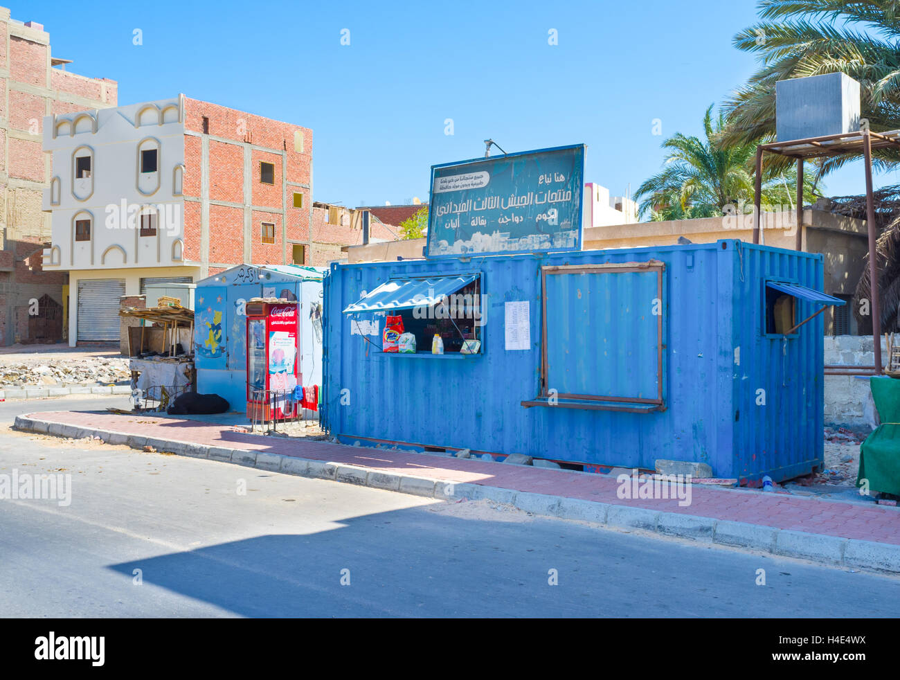 The Small Shop Made From Container With Household Goods In Poor