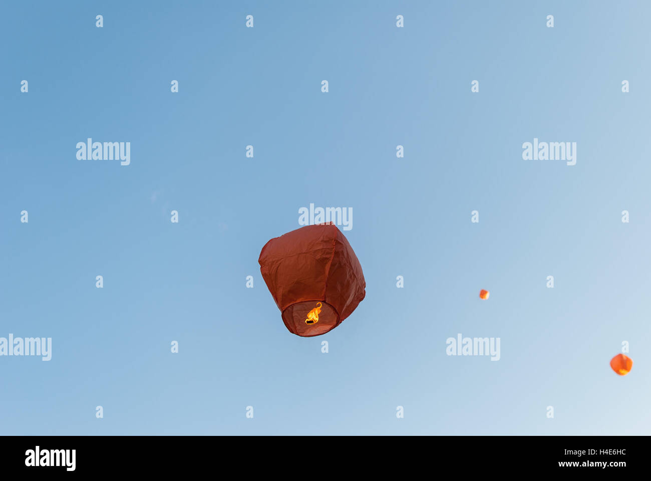 red paper lantern, flying in the sky Stock Photo Alamy
