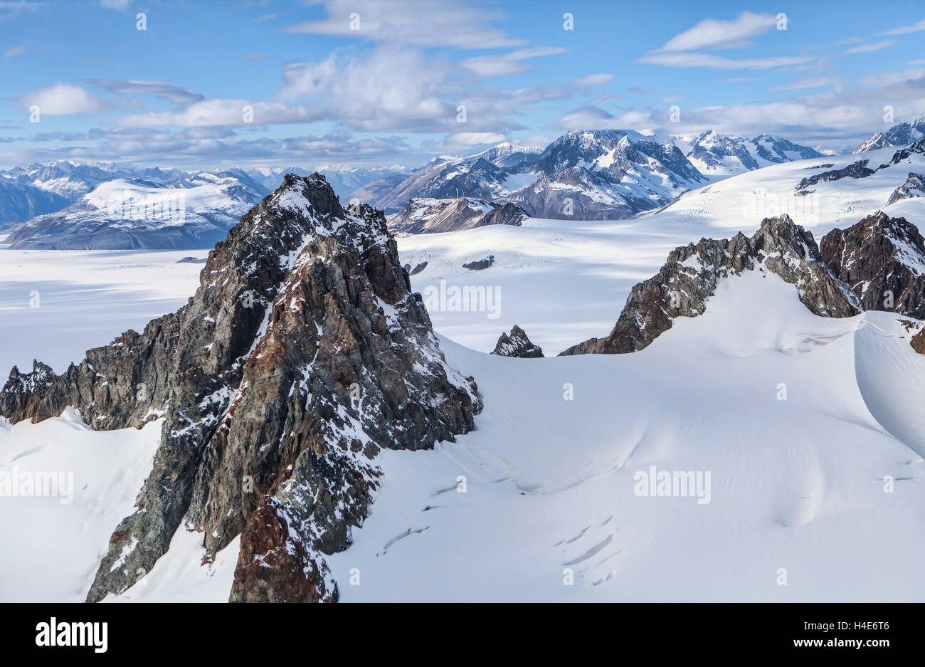 St. Elias Mountains in Southeast Alaska aerial with clouds. Stock Photo