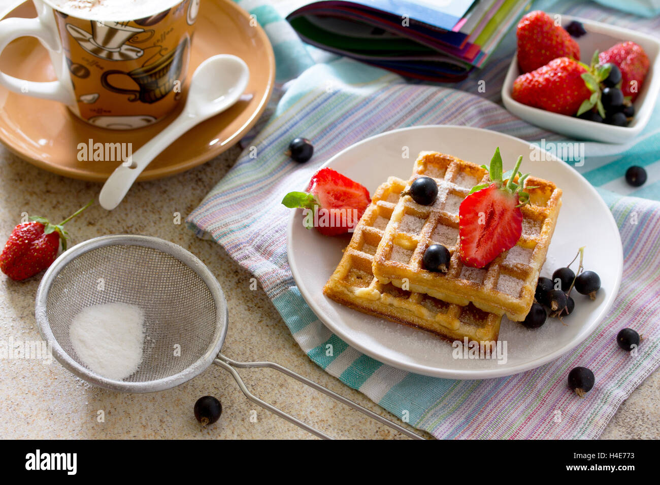 Traditional Belgian waffles with cream whipped cream and fresh berries ...