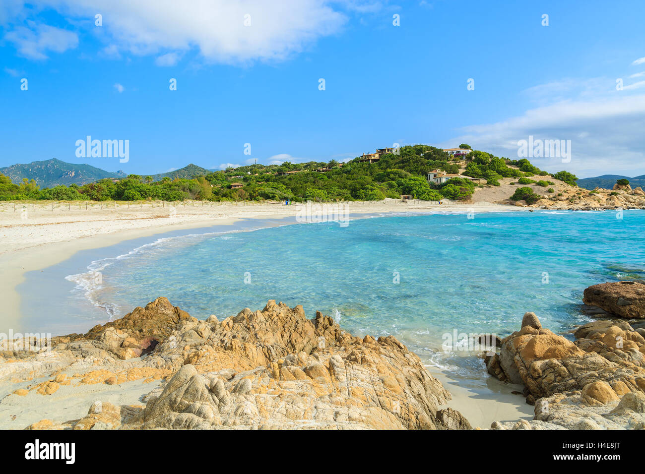 Turquoise sea water of Porto Giunco beach on coast of Sardinia island, Italy Stock Photo