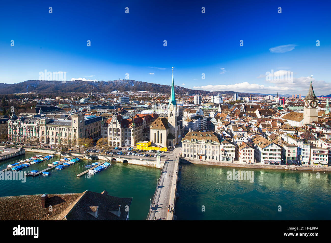View of historic Zurich city center with famous Grossmunster Church and ...