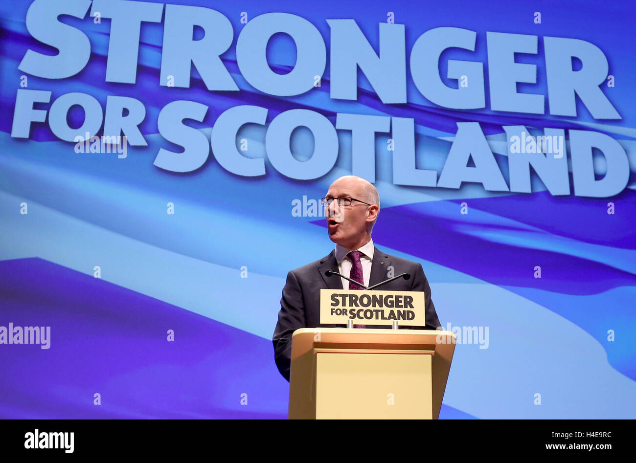 Deputy First Minister John Swinney delivers his speech at the SNP conference in Glasgow. Stock Photo