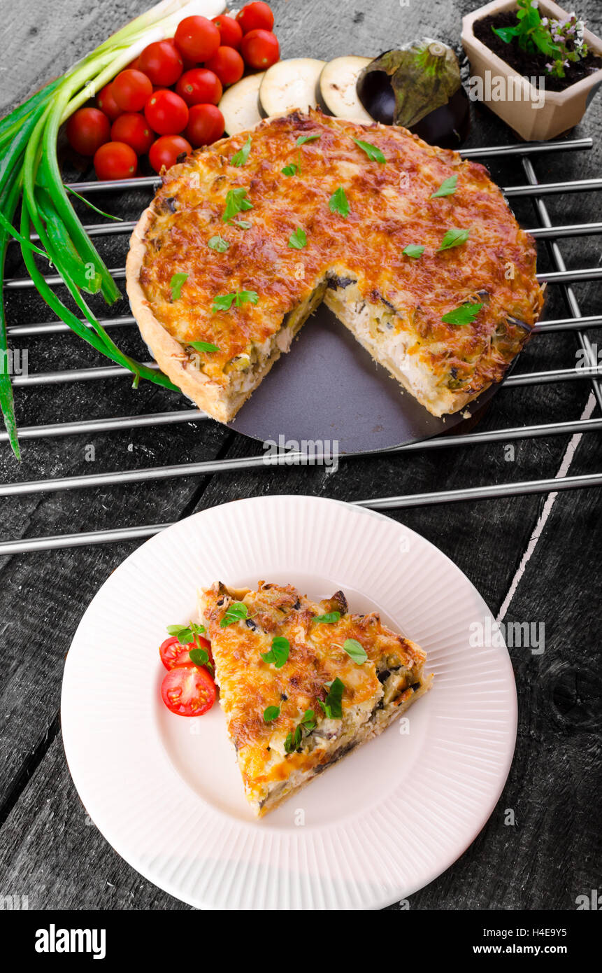 French Quiche with eggplant, leeks and spring onions, bathed in a