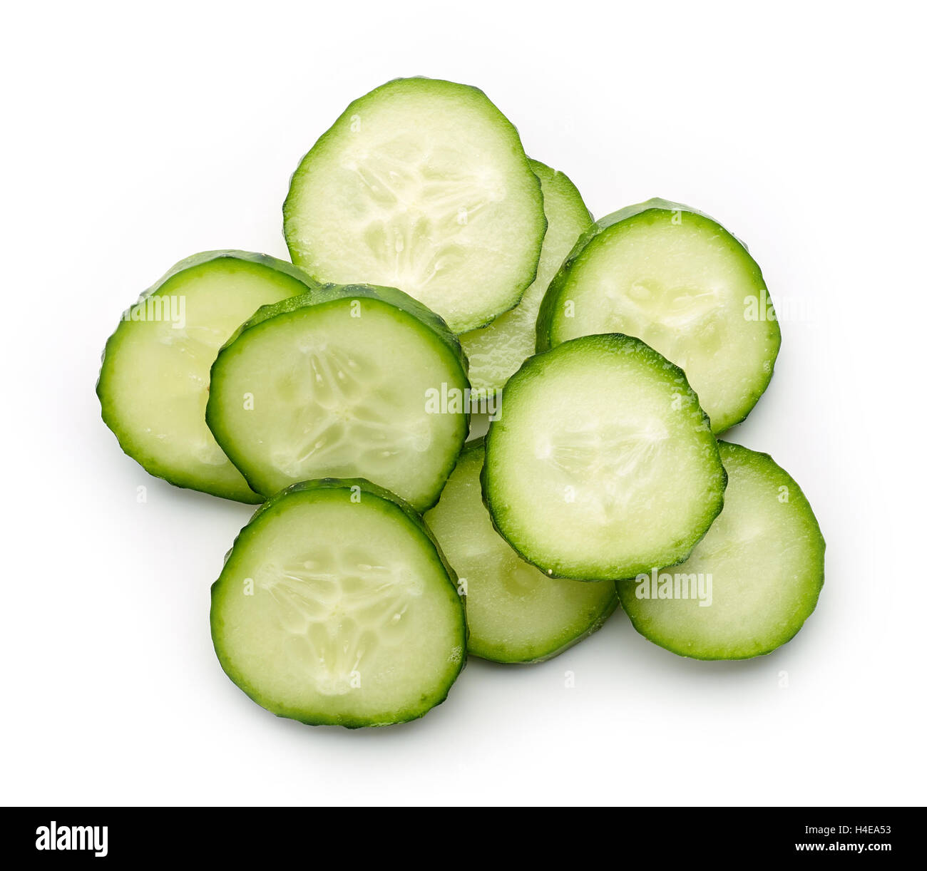 Fresh cucumber slices isolated on white background, top view Stock Photo