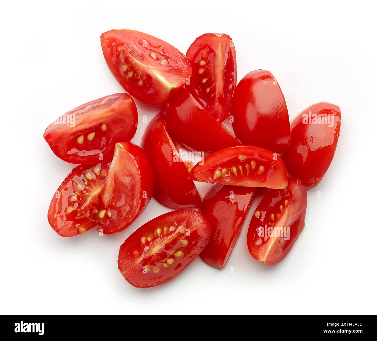 Heap of cherry tomato lobes isolated on white background, top view Stock Photo