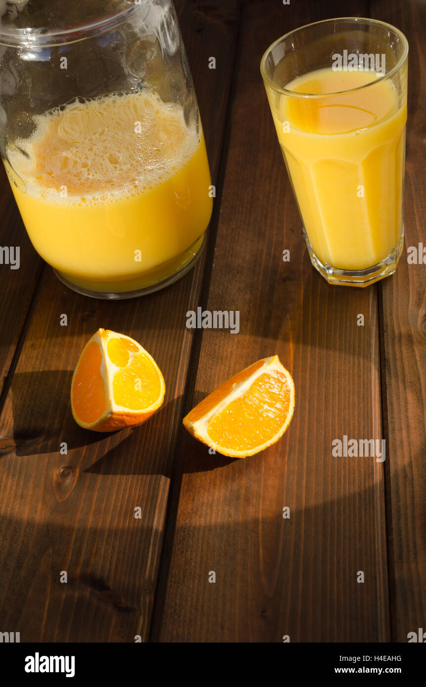 Simple picture orange with fresch juice on table Stock Photo