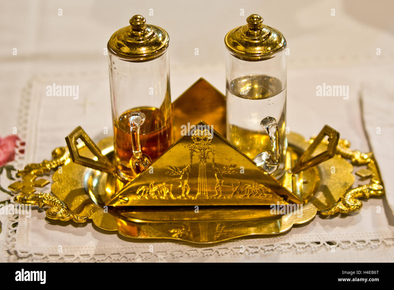 blood and water coming out from the side of Jesus Christ on the altar