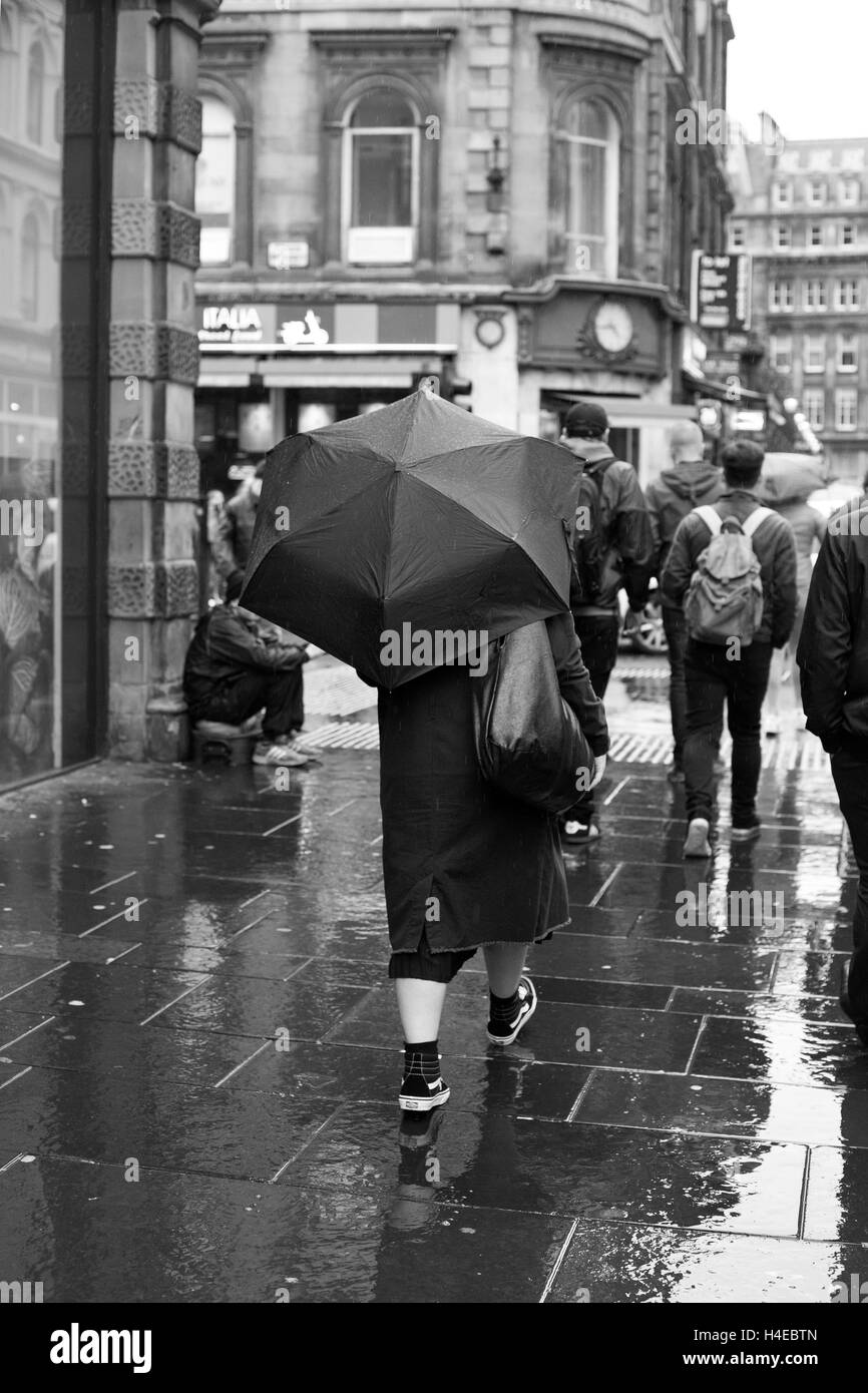 Street Photography, Umbrella in the Rain, Stock Photo