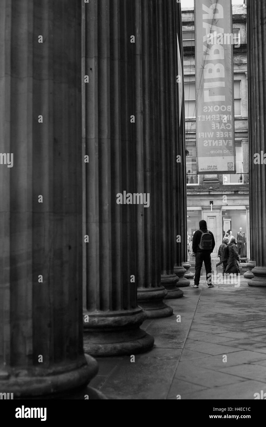 Street Photography, Columns, Man Alone Stock Photo