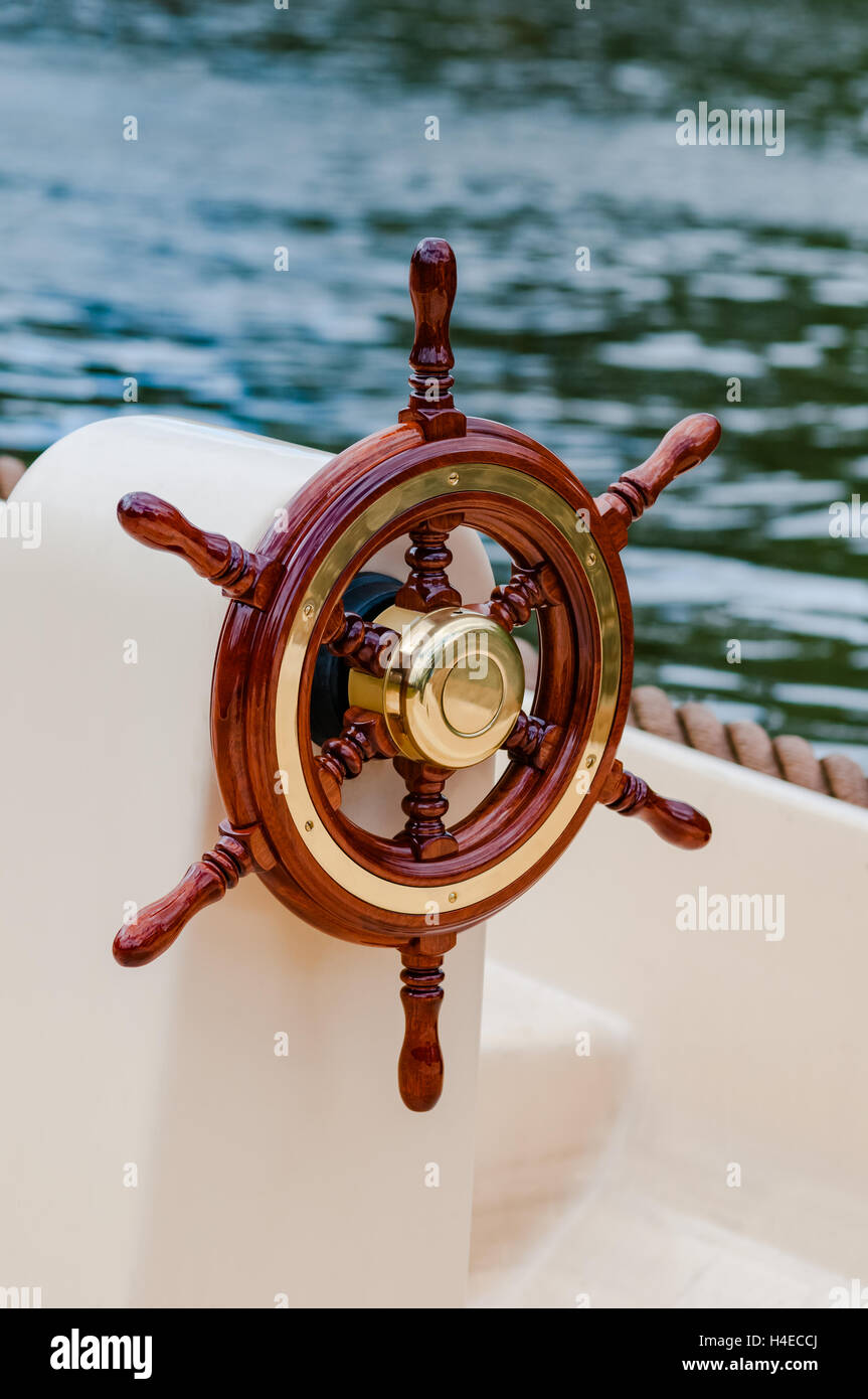 Ship helm steering wheel boat yacht nautical equipment attractive Stock Photo Alamy
