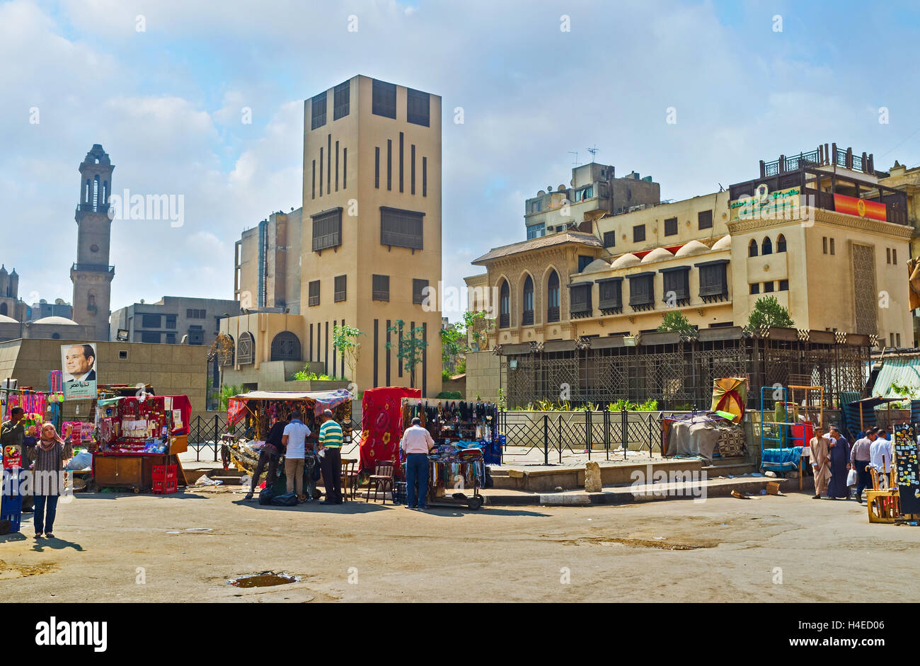 The market stalls next to Al Azhar Avenue offer fresh water, clothes and tourist souvenirs, Cairo Egypt Stock Photo