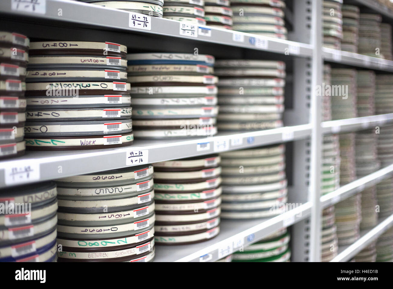 Storage reels in a high density library, an off-site environmentally controlled storage and preservation facility for university references. Stock Photo