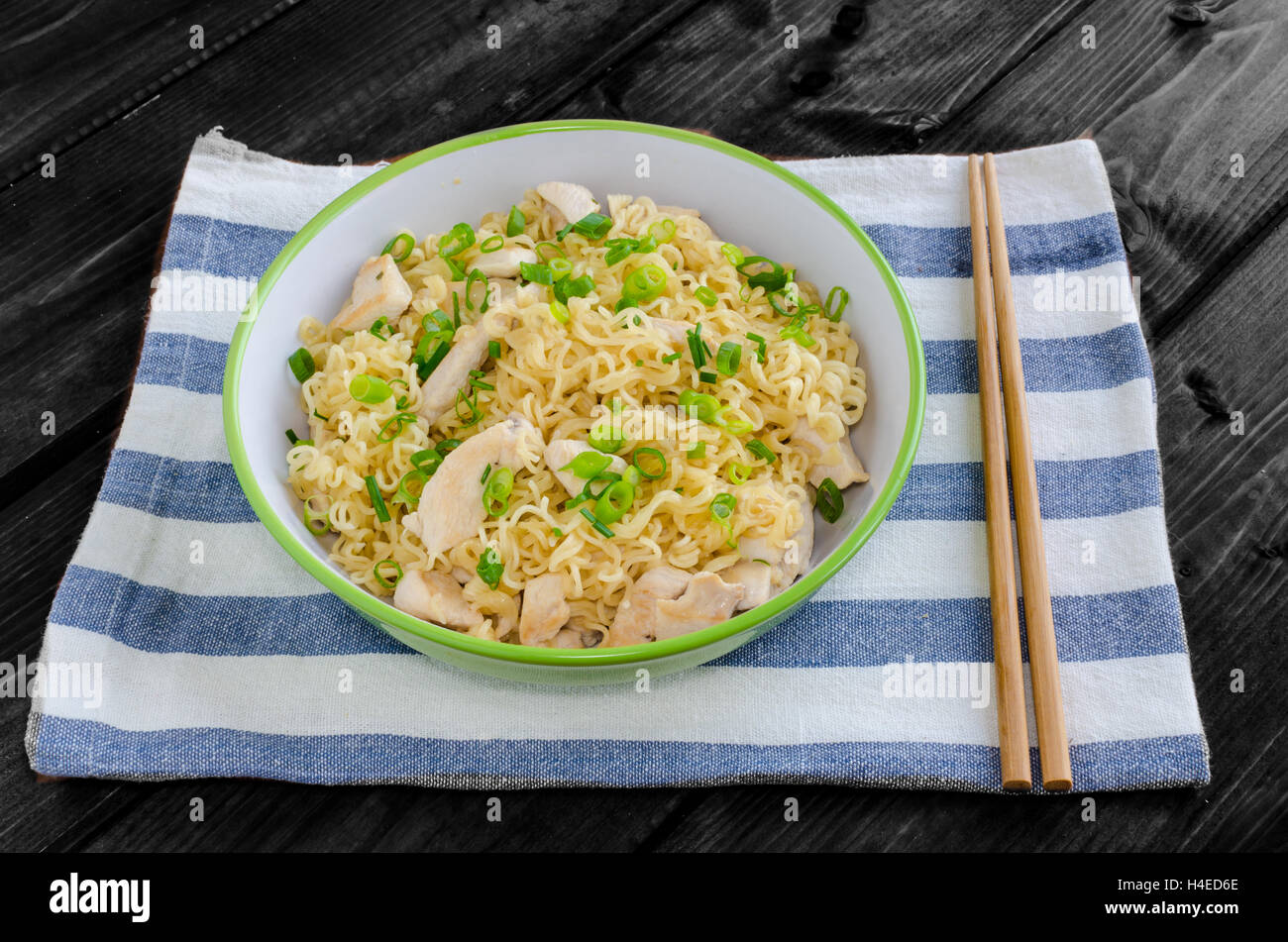 Chinese noodles, fast but delicious food with chopsticks Stock Photo