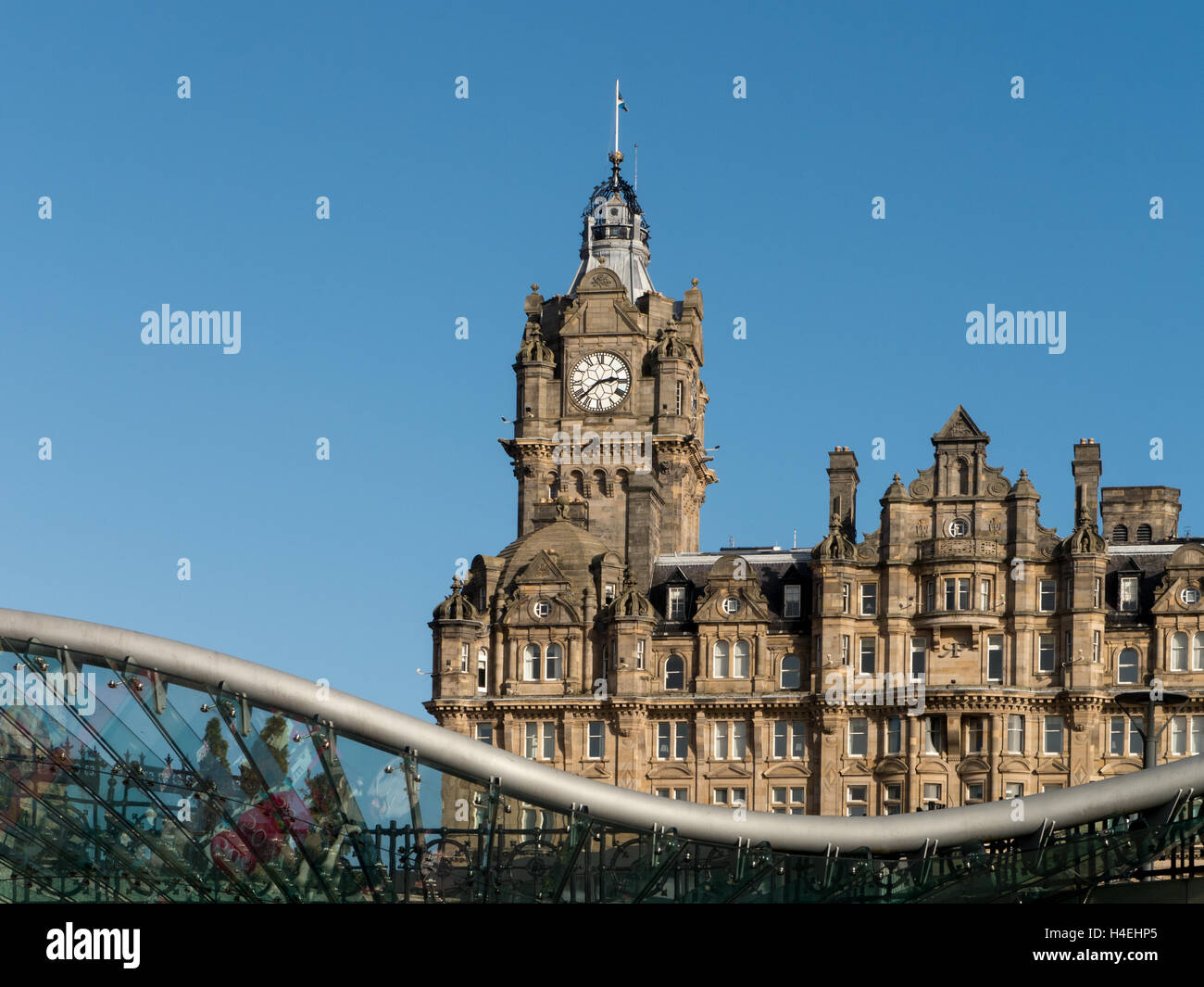 The Balmoral Hotel, with its iconic Clock Tower, viewed above the modern Waverley Station,    Edinburgh, Scotland, UK Stock Photo