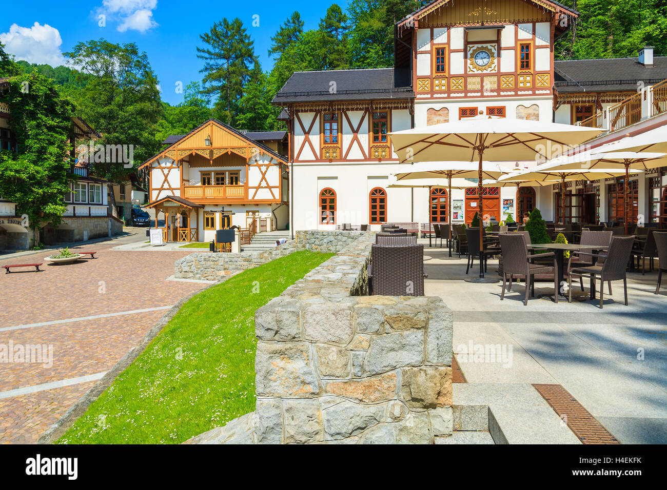 Park with historic buildings in town centre of Szczawnica town, Poland Stock Photo