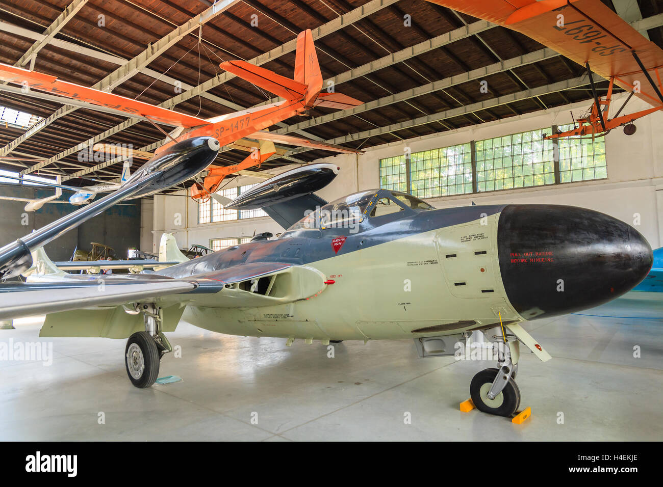 KRAKOW MUSEUM OF AVIATION, POLAND - JUL 27, 2014: old aircraft on exhibition in indoor museum of aviation history in Krakow, Poland. In summer often airshows take place here. Stock Photo