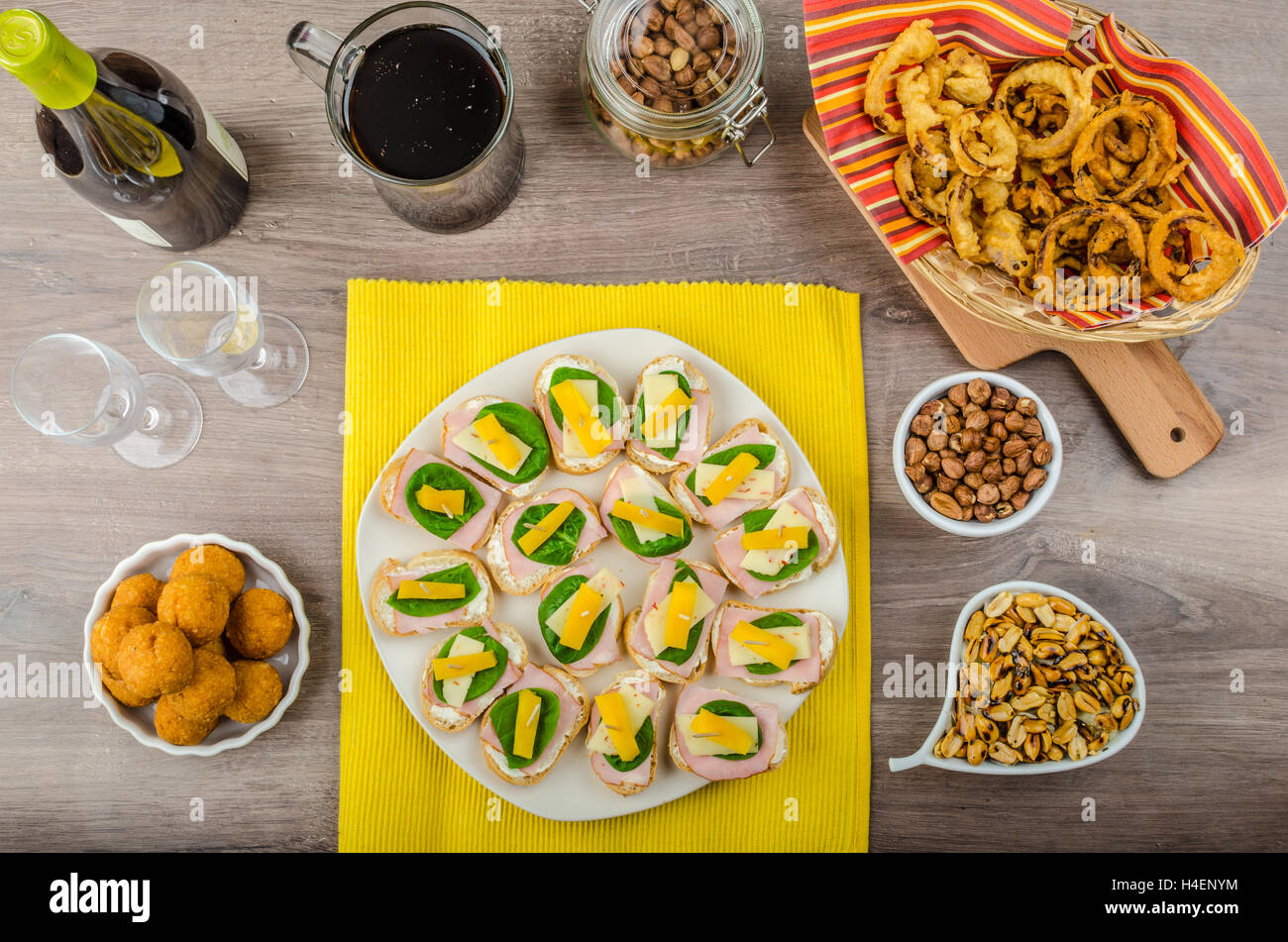 New Year's Eve meal canapes with ham, cheese and spinach leaves