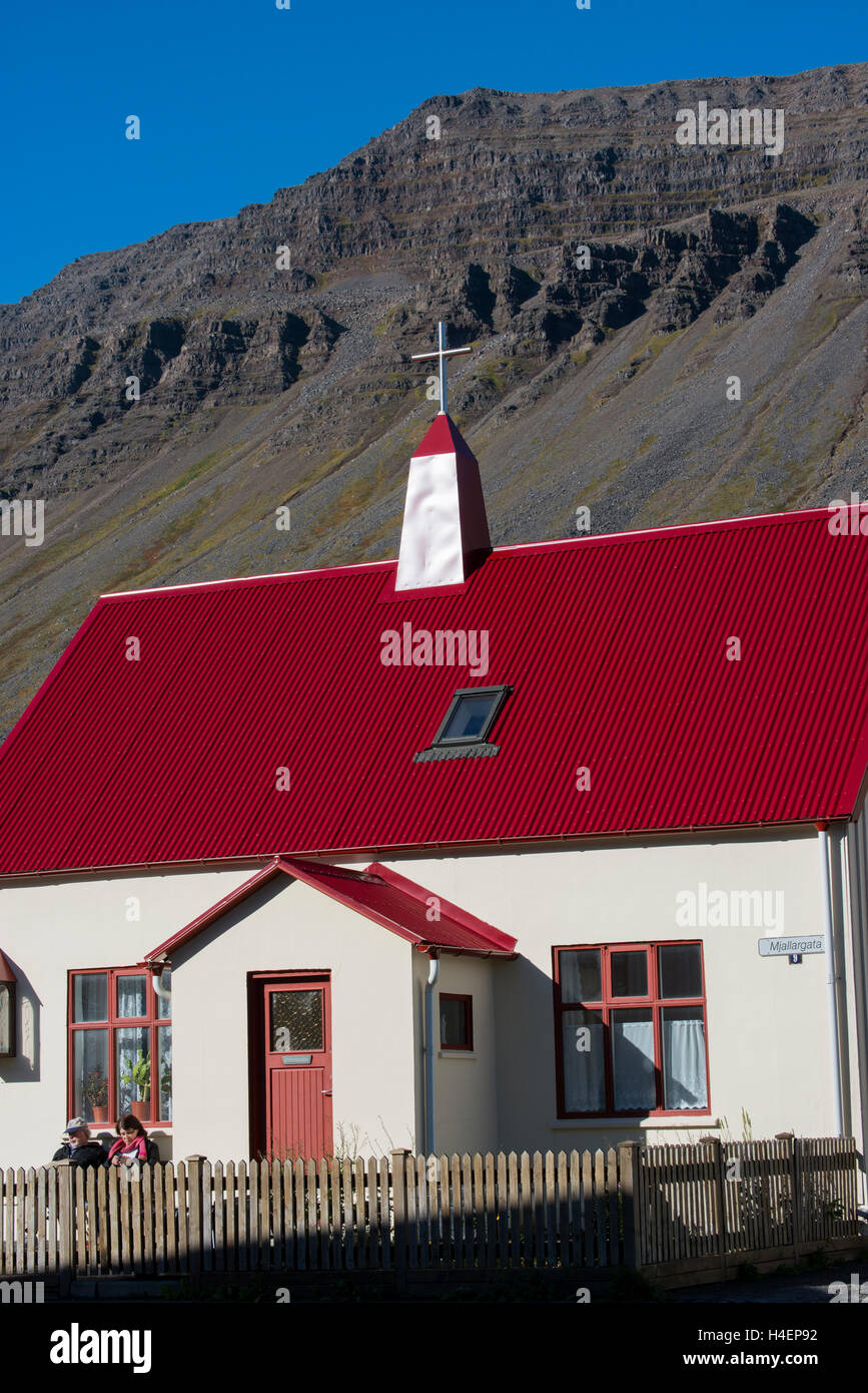 Iceland, West Fjords, Isafjordur, Old Town. Historic church with red roof. Stock Photo