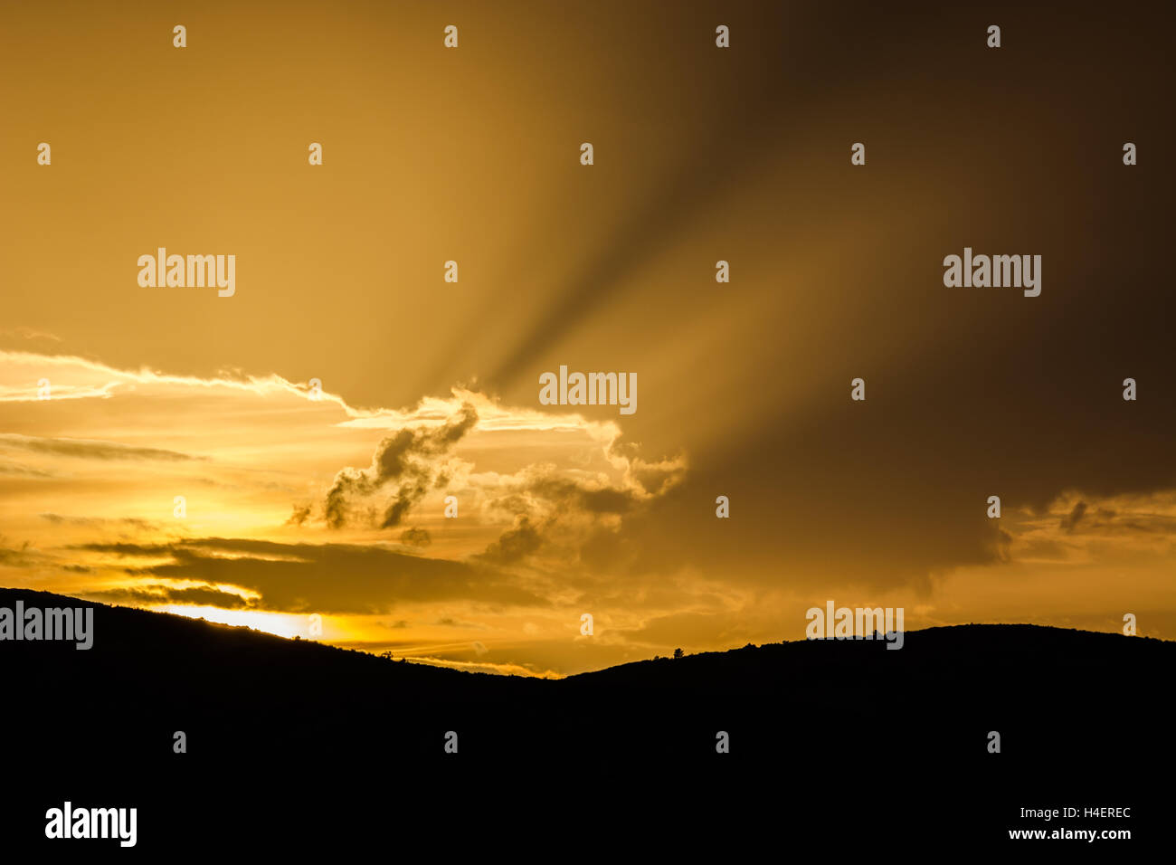 Rays of sunlight emerging from the clouds Stock Photo - Alamy