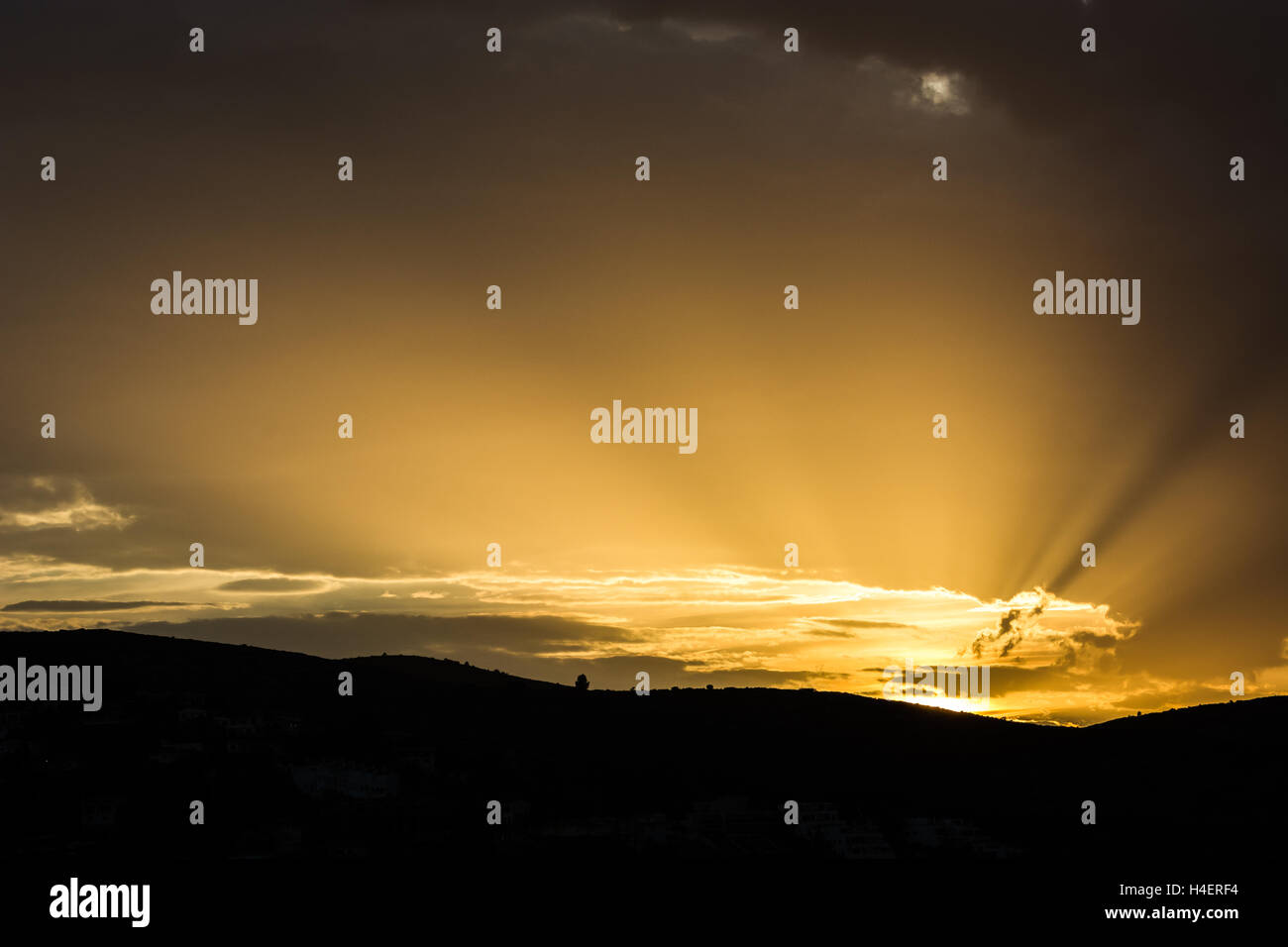 Rays emerging from clouds hi-res stock photography and images - Alamy