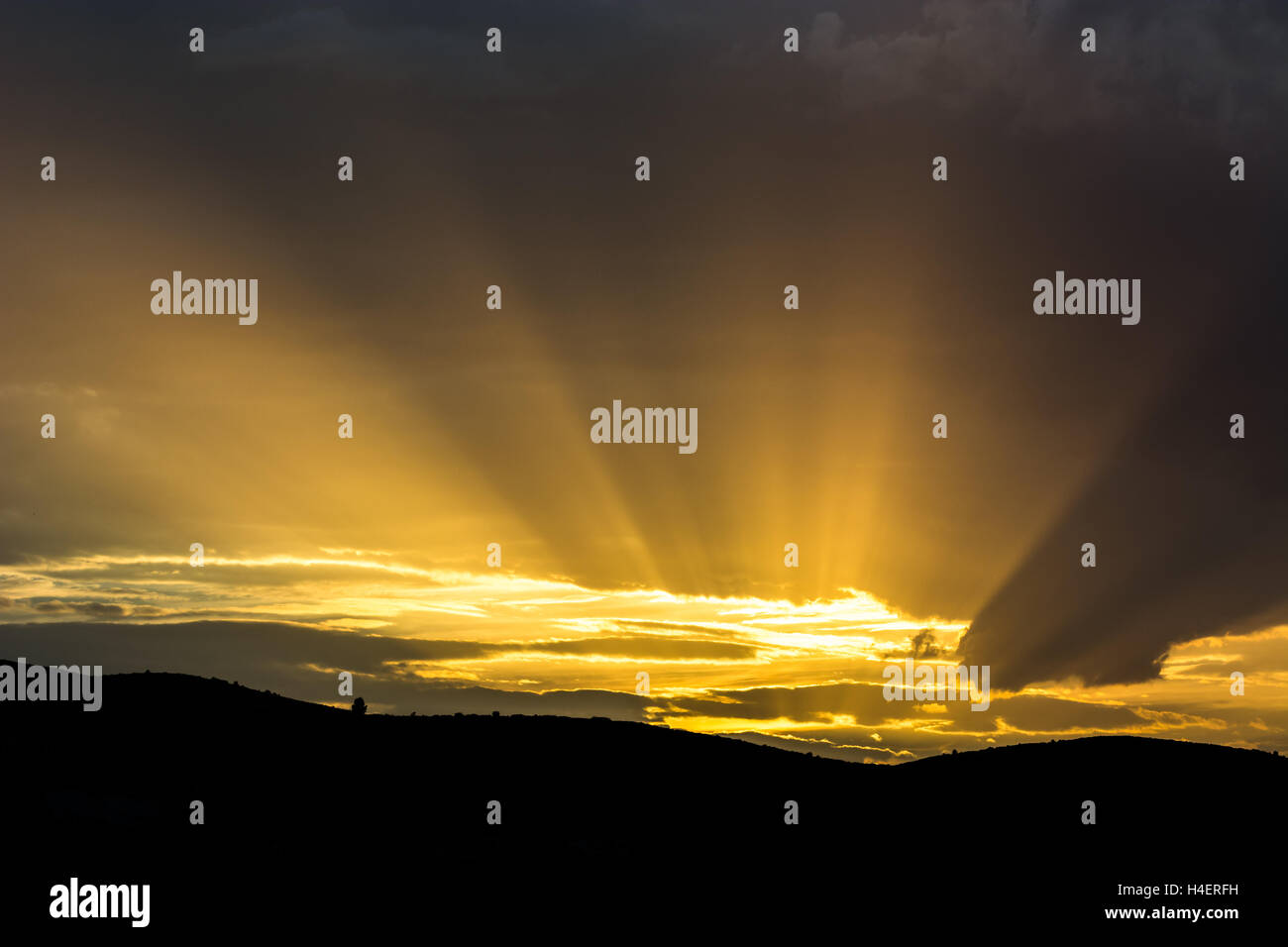 Rays of sunlight emerging from the clouds Stock Photo - Alamy