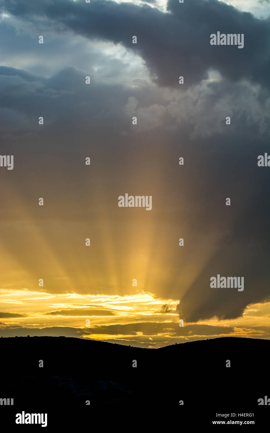 Rays of sunlight emerging from the clouds Stock Photo - Alamy