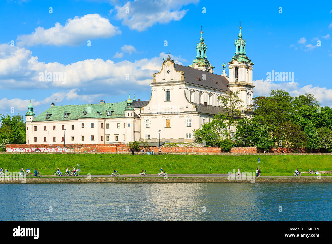 Facade of cathedral building in Krakow along a Vistula river on sunny day - church 'Na Skalce', oldest sanctuary in Krakow, Poland Stock Photo