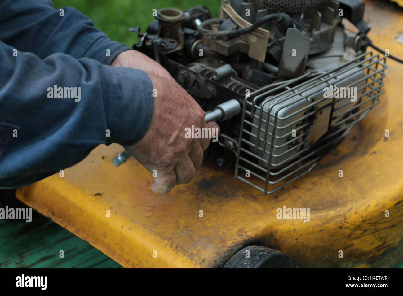 repairing lawn mower engine Stock Photo Alamy