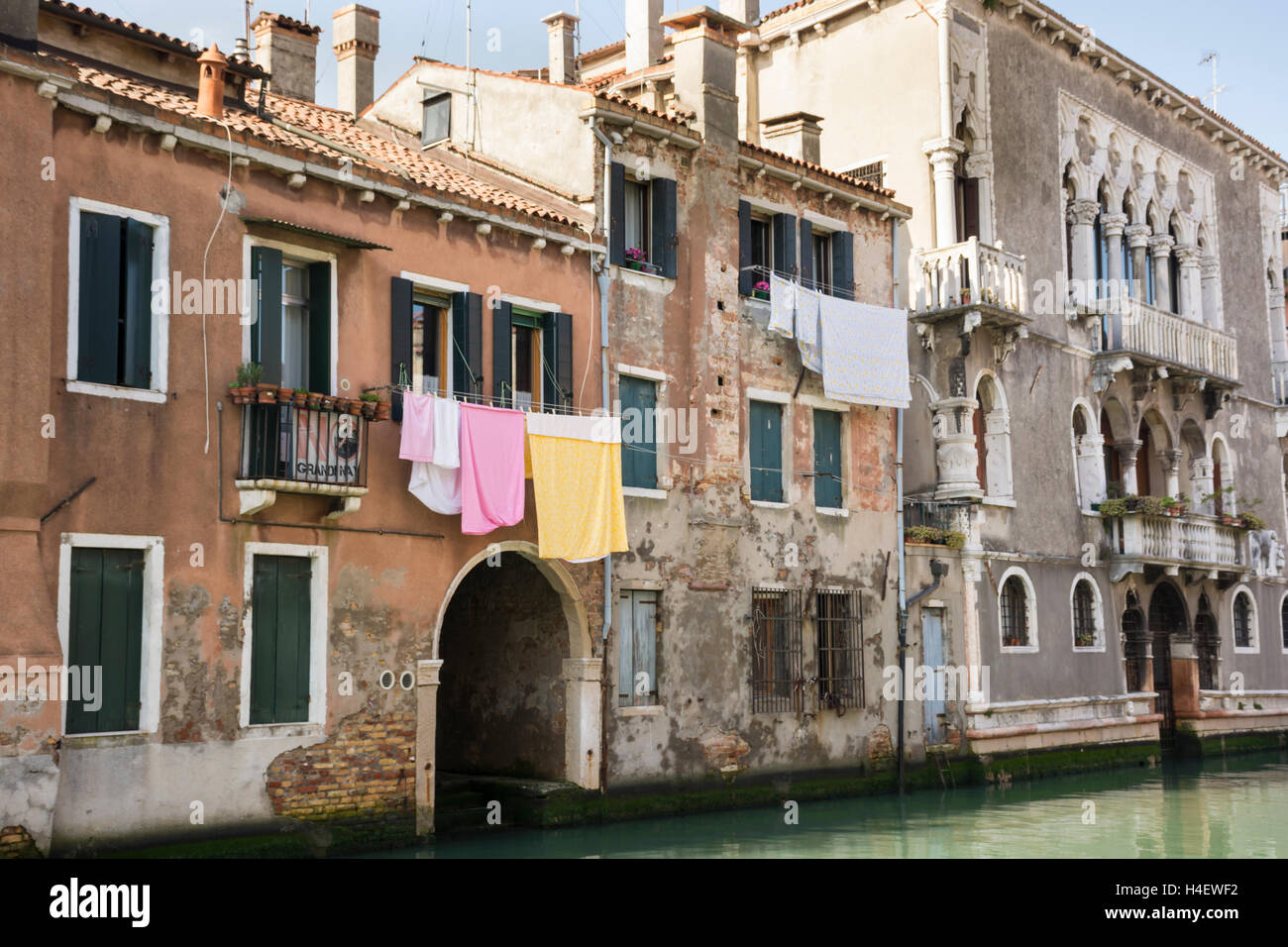 A Venice canal with hanging clothes. Venice, Italy, Europe Stock Photo