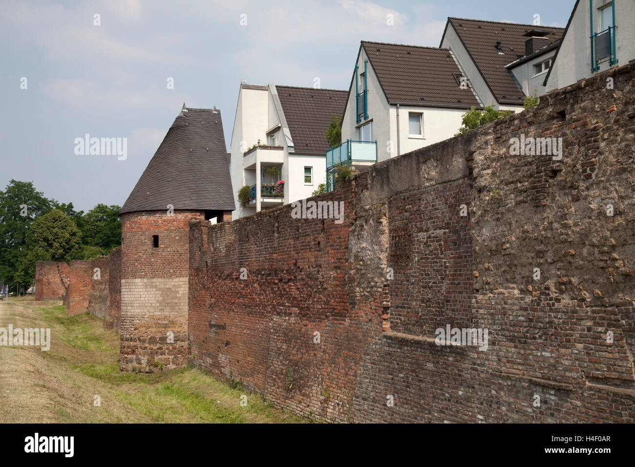Old city walls, modern homes, inner harbour, Duisburg, Ruhrgebiet region, North Rhine-Westphalia Stock Photo
