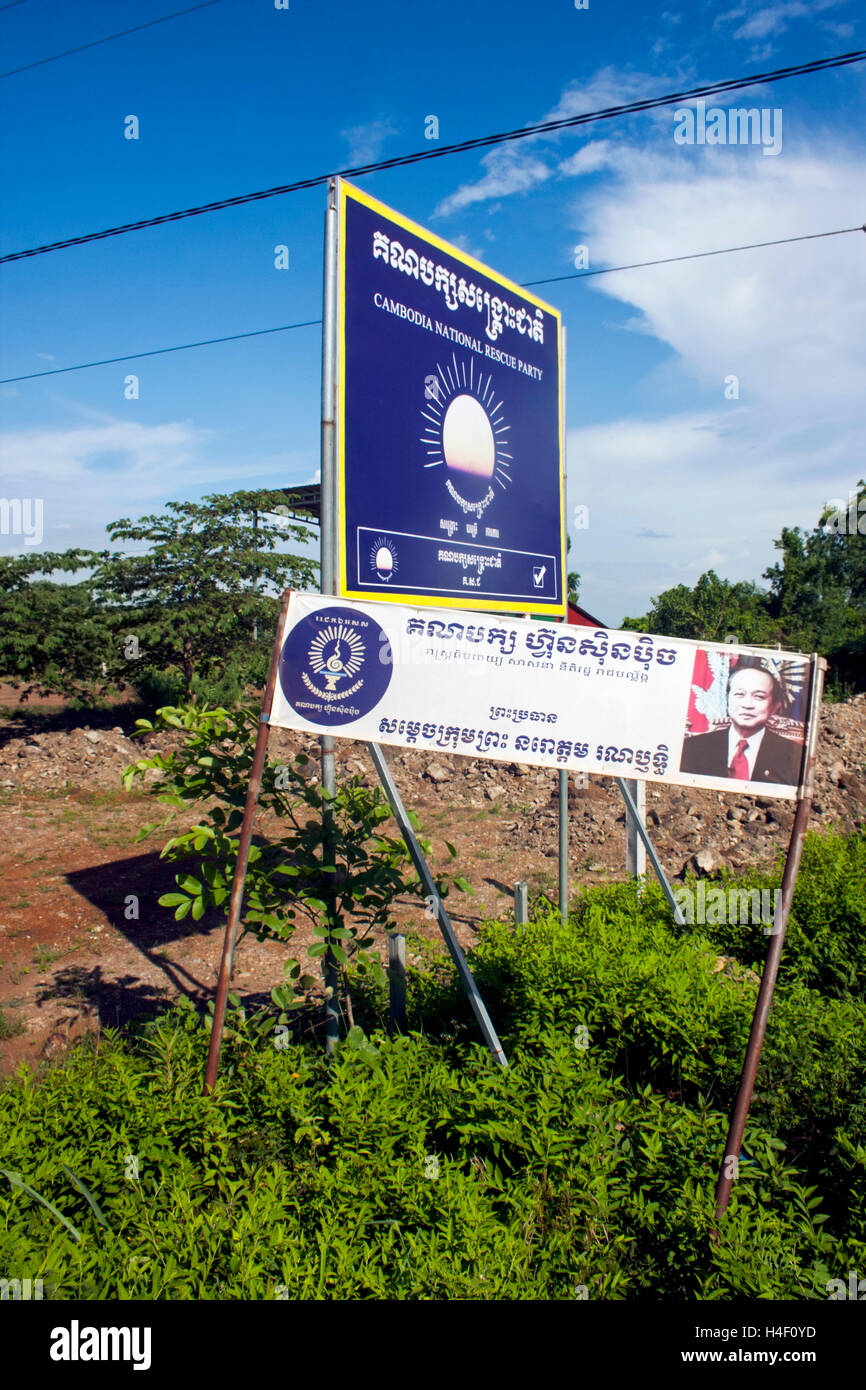 Signs depicting Cambodian political parties are displayed near a road in Chork Village, Cambodia. Stock Photo