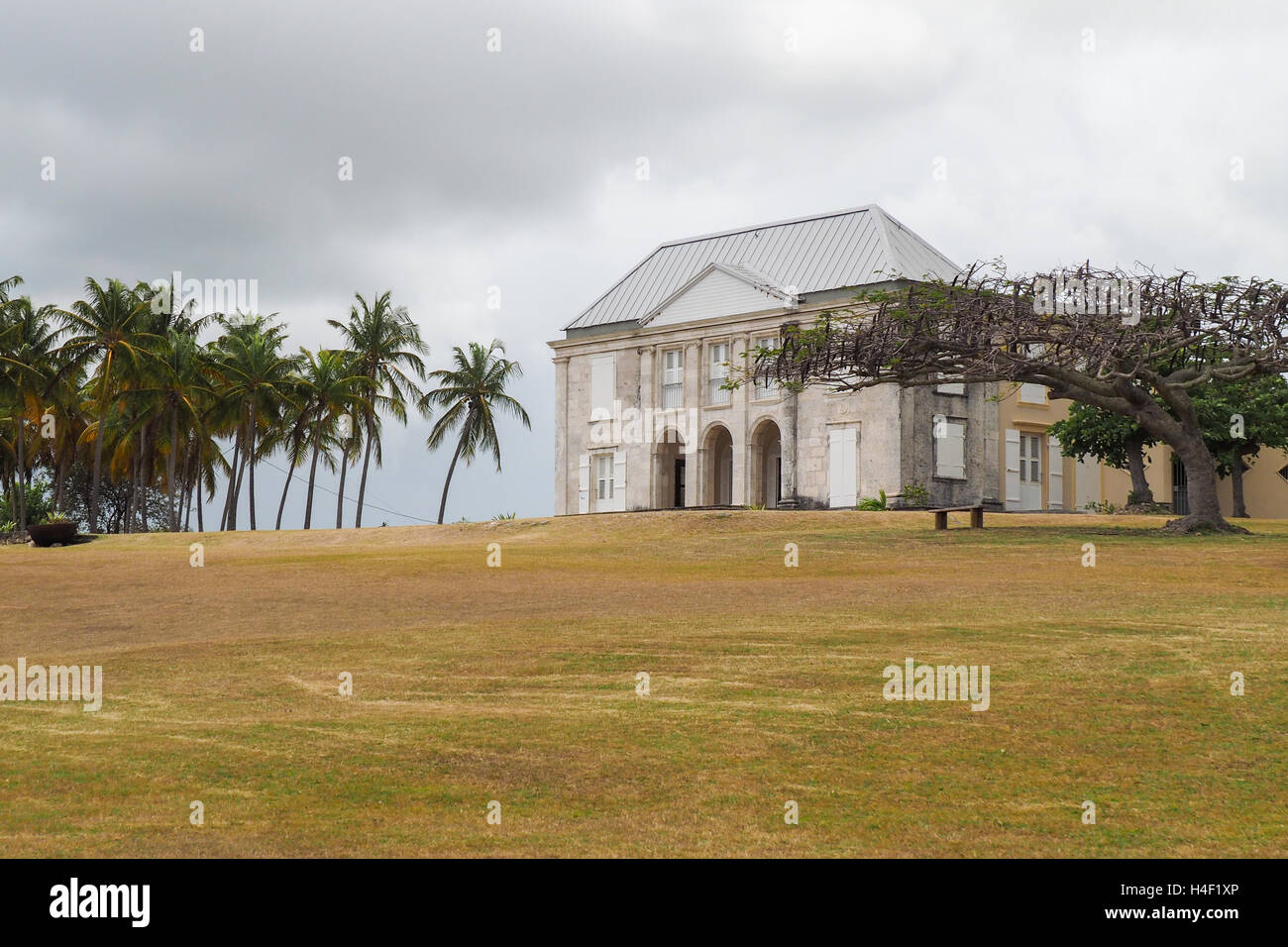 Facade of Habitation Murat and garden in Marie Galante, ancient slaves house and sugar factory Stock Photo