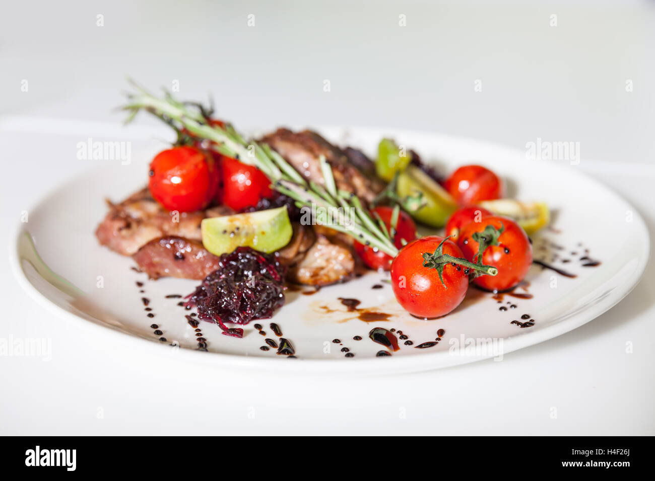 Meat dish with vegetables Stock Photo Alamy