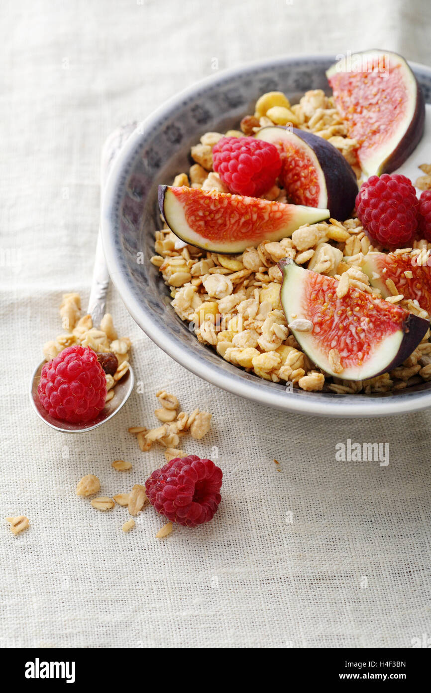 Cereals with figs and raspberry, food closeup Stock Photo