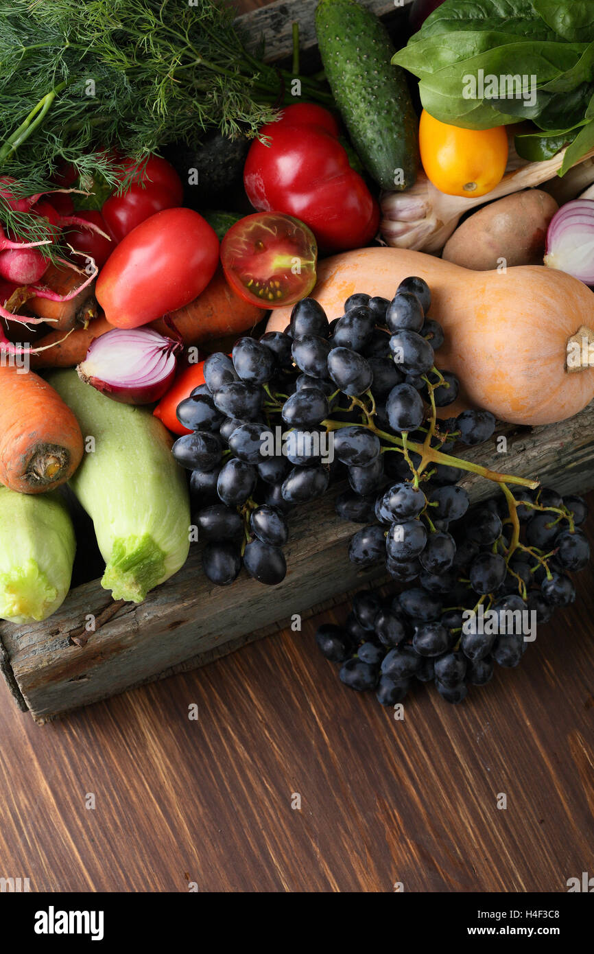 Fresh organic vegetables wood background, food top view Stock Photo - Alamy