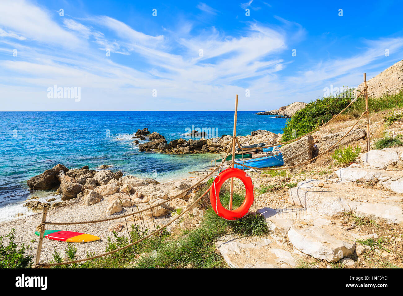 Life ring on path to Petani beach on coast of Kefalonia island, Greece Stock Photo
