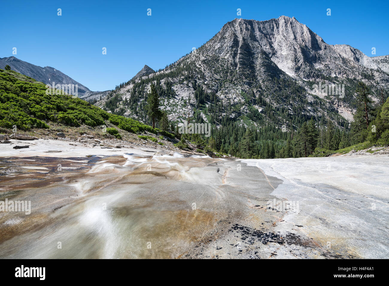 River running over bedrock, John Muir Tarail, Sierra Nevada mountains, California, United States of America, North America Stock Photo