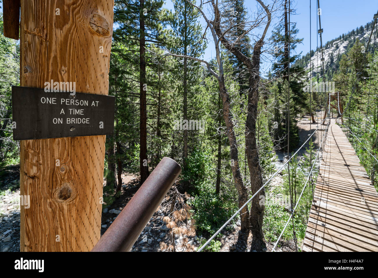 Suspension bridge on John Muir Trail, Sierra Nevada mountains, California, United States of America, North America Stock Photo