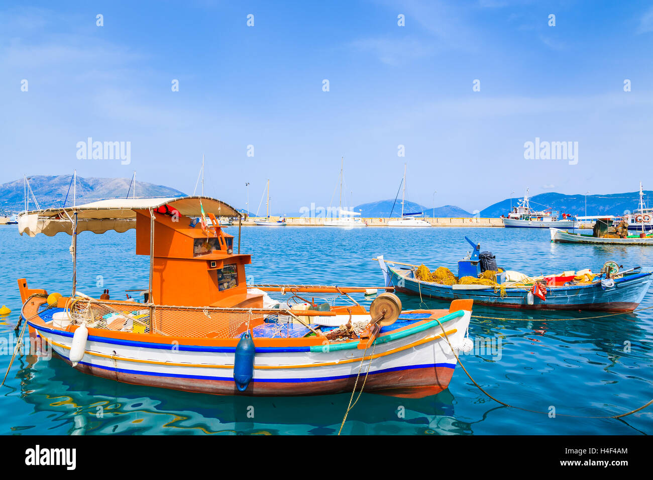 Traditional Greek fishing boat in port of Sami village on Kefalonia island, Greece Stock Photo