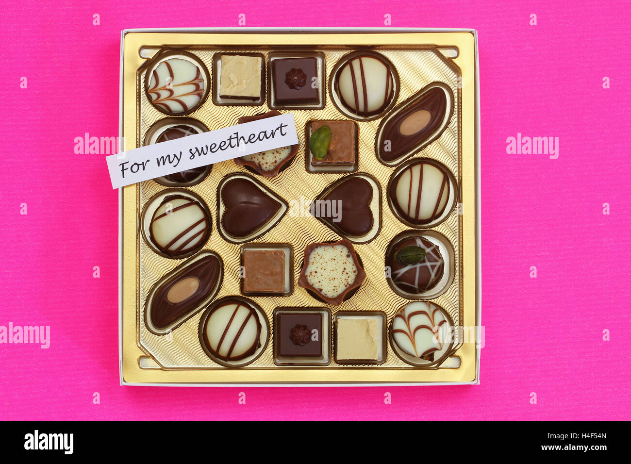 For my sweetheart card with box of delicious chocolates on pink background Stock Photo