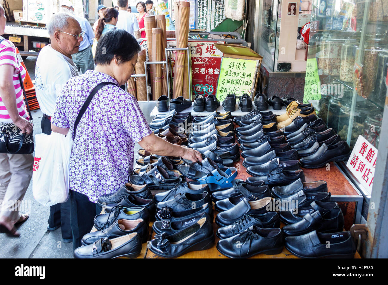 Shoes for sale in chinatown hi-res stock photography and images