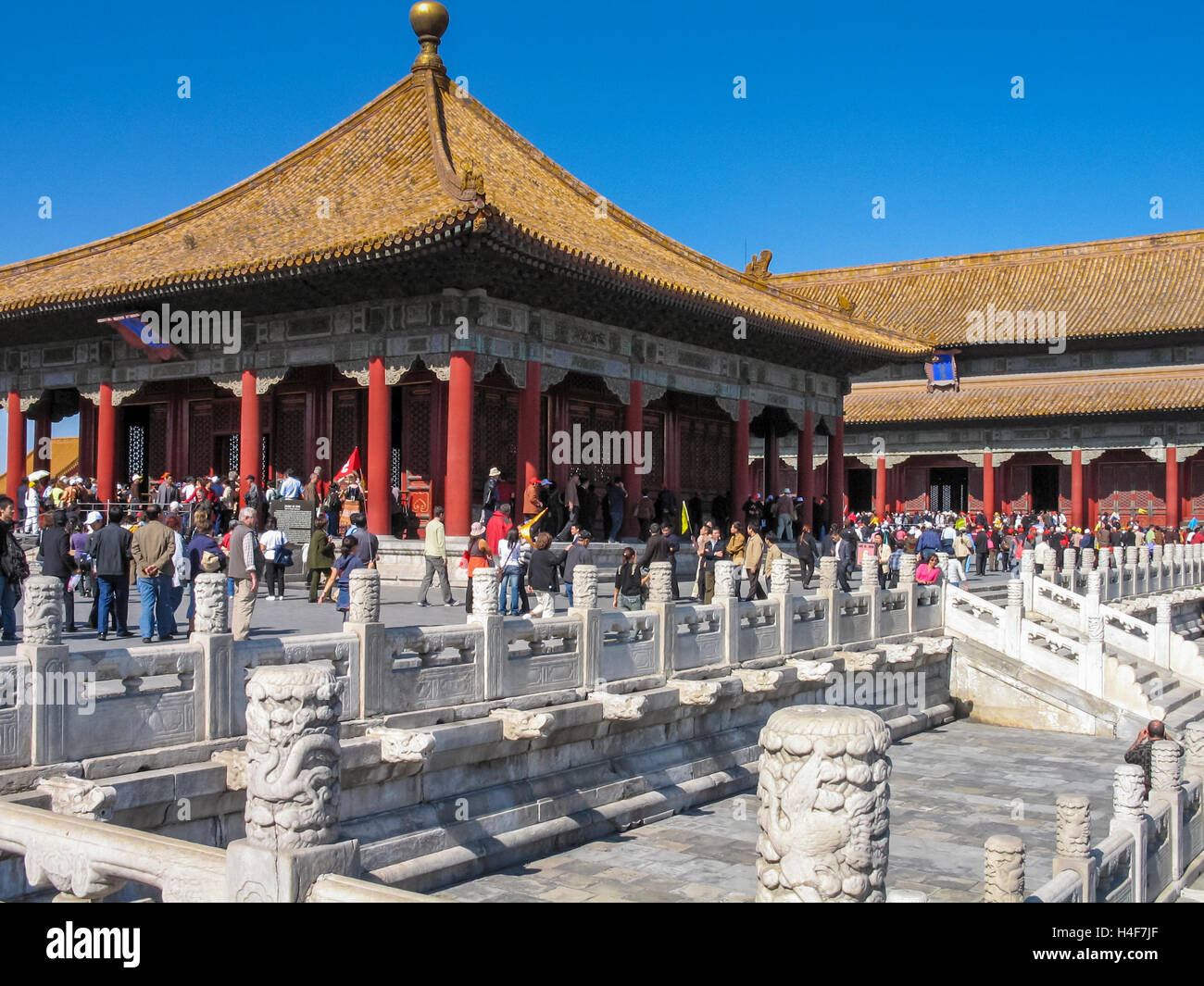 Tourists at hall of preserving harmony hires stock photography and